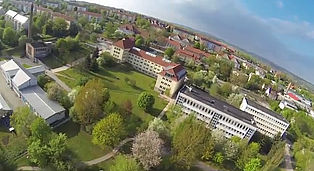 Our green campus from above, the main building and houses 19 and 20