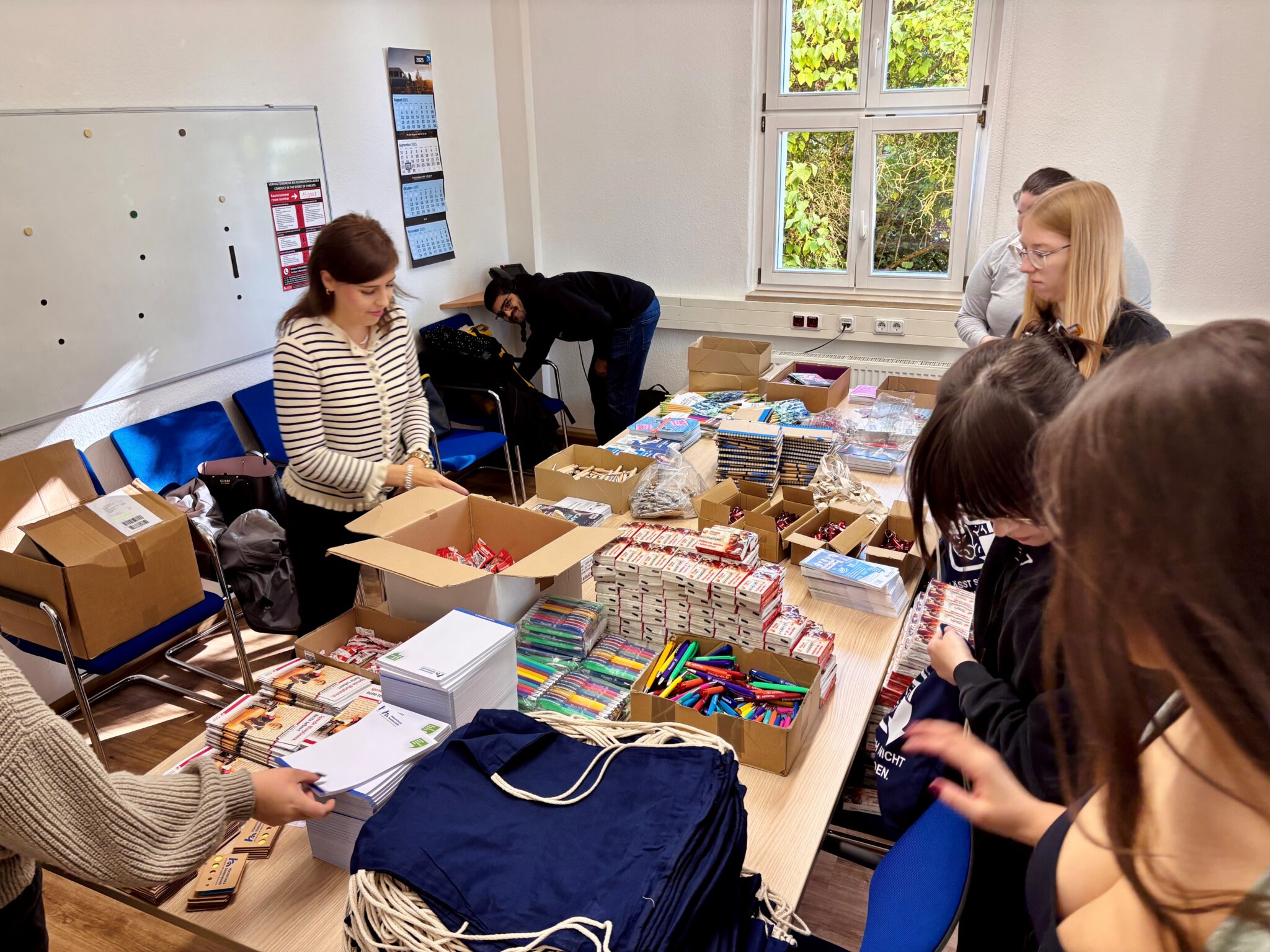 Tables full of materials and activities.