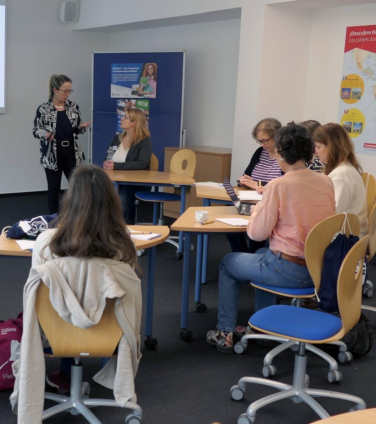 Group discussion in a seminar room.