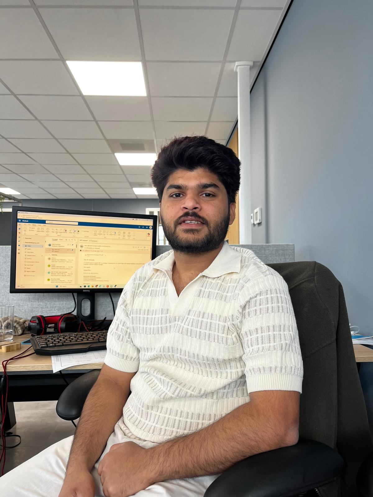 Man sitting at his desk in the office.